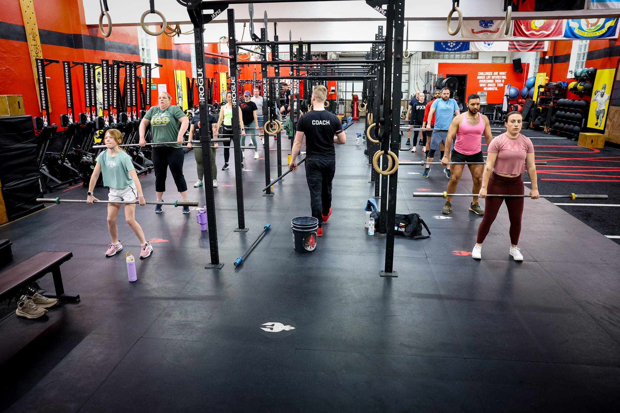 Group training session helping members stay motivated and consistent at PXM Fitness